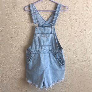 Light wash/ distressed overalls